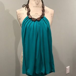 Turquoise shirt with wooden neck